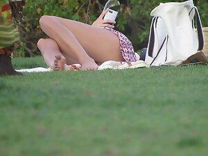 Pussy slip in upskirt caught during picnic in park Picture 3
