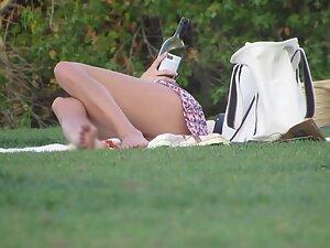 Pussy slip in upskirt caught during picnic in park Picture 4