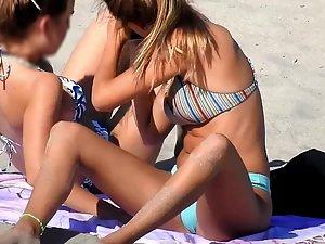 Two amazing teen girls bending over on beach Picture 2