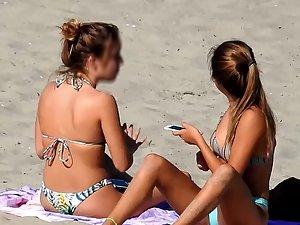 Two amazing teen girls bending over on beach Picture 3