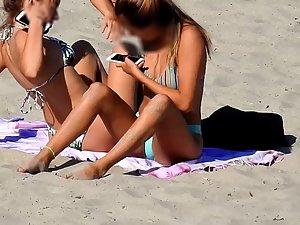 Two amazing teen girls bending over on beach Picture 4