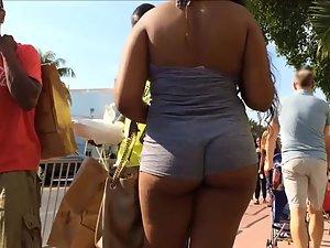 Black girl puts her big booty on display