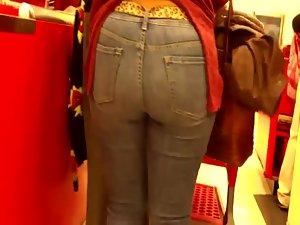 Mature woman's butt at a cash register Picture 4