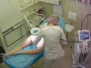 Young woman gets a hair removal treatment Picture 2
