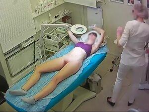 Young woman gets a hair removal treatment Picture 6