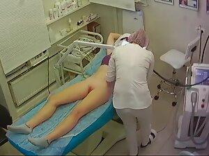 Young woman gets a hair removal treatment Picture 7