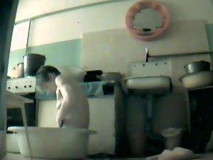Poor woman spied as she washes herself Picture 2