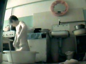 Poor woman spied as she washes herself Picture 3
