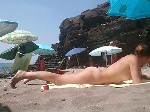 Incredible ass on a nudist beach Picture 8