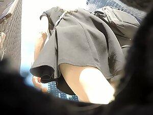 Gentle ass in mesh panties got visible in upskirt Picture 2