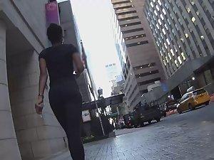 Following an ebony girl in tights