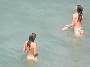 Teen nudist trio enjoying the water waves Picture 5