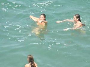 Teen nudist trio enjoying the water waves Picture 7