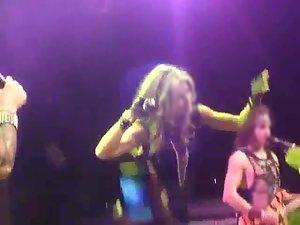 Kinky girl shows boobs on a concert stage Picture 2