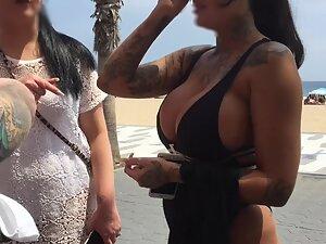 Voyeur gets close to big fake boobs by the beach Picture 4