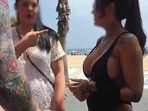 Voyeur gets close to big fake boobs by the beach Picture 7