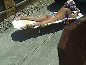 Sexy neighbor woman spied while she tans Picture 1