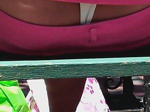 Thong peeks out from pink pants Picture 2