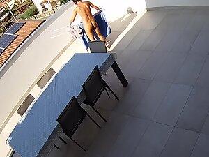 Peeping on naked tourist woman on the terrace Picture 2