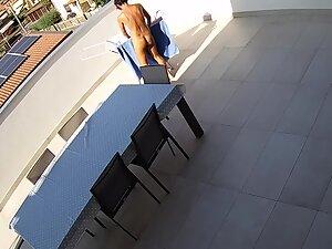 Peeping on naked tourist woman on the terrace Picture 3