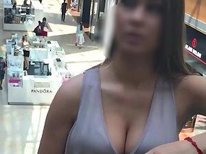 Busty beauty caught going up on moving stairs Picture 1