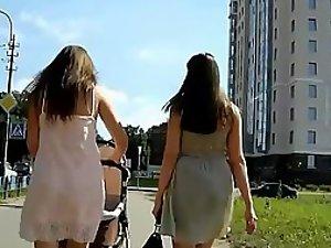 Young milfs and their short skirts get spied Picture 1