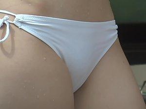 Cameltoe shows beautiful pussy inside white bikini Picture 2