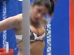 Cute girl undresses in a big brother show