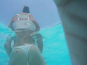Underwater camera focuses on young butt Picture 1