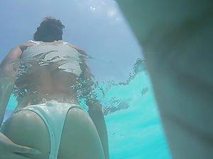 Underwater camera focuses on young butt Picture 2