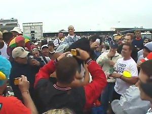 Happy lady flashes her tits to the crowd Picture 4