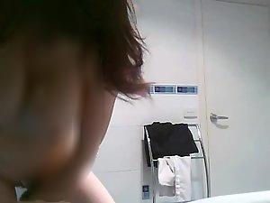 Busty woman wipes off after a shower Picture 3