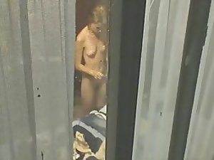 Zooming in on a nude neighbor woman