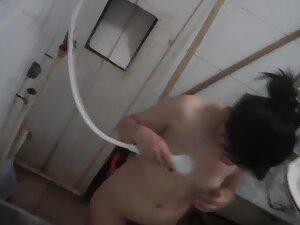 Voyeur does a quick peep on naked asian girl in shower Picture 7