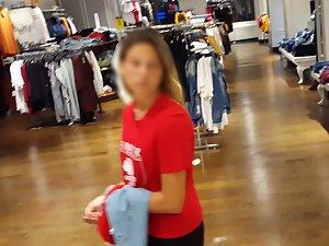 Fit girl waits in line to try some new clothes Picture 1