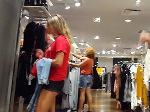 Fit girl waits in line to try some new clothes Picture 5