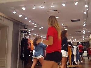 Fit girl waits in line to try some new clothes Picture 6