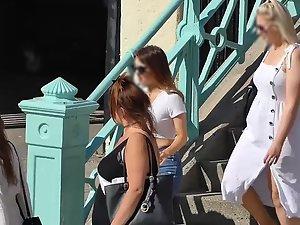 Firm tits bounce as she steps down stairs Picture 2