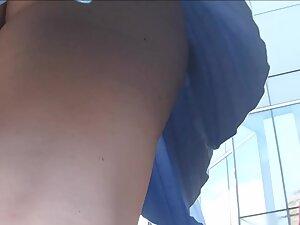 Bubble butt keeps showing itself in upskirt of fluffy skirt Picture 5