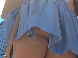 Bubble butt keeps showing itself in upskirt of fluffy skirt Picture 7