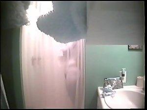 Peeping in on her showering Picture 3