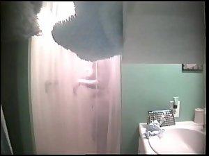 Peeping in on her showering Picture 4