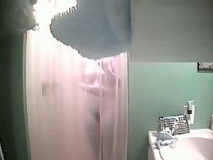 Peeping in on her showering