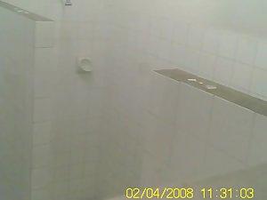 Voyeur spies a teen girl showering Picture 2