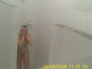 Voyeur spies a teen girl showering Picture 4