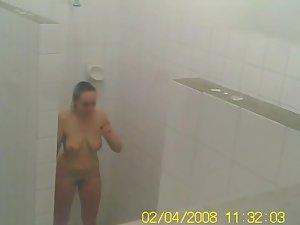 Voyeur spies a teen girl showering Picture 6