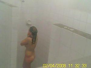 Voyeur spies a teen girl showering Picture 8