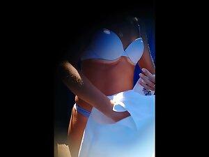 Voyeur peeps a beautiful milf pussy in beach cabin Picture 1