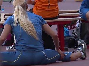 Sexy athlete stretching before competition Picture 1