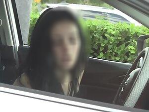 Nice boobs of a cute but suspicious girl in car Picture 3